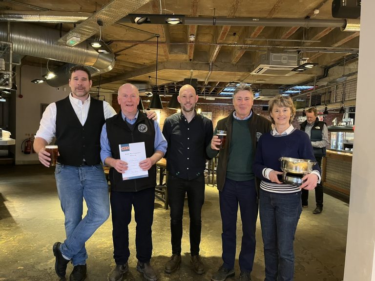 Celebrating a Harmonious Supply Chain: Flo Vialan, Head Brewer at Purity Brewing, stands with award-winning growers (and Charles Faram Farms members) of the hops used in Purity Brewing’s beer and the Purity Brewing PureCraft Manager - showcasing the relationships, traceability, and localism in every pint. L-R Simon Parker, PureCraft Manager Matt Lockren, Richie Phillips, and Sarah Hawkins