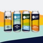 This image shows a selection of lakes brew co beer on a colourful background