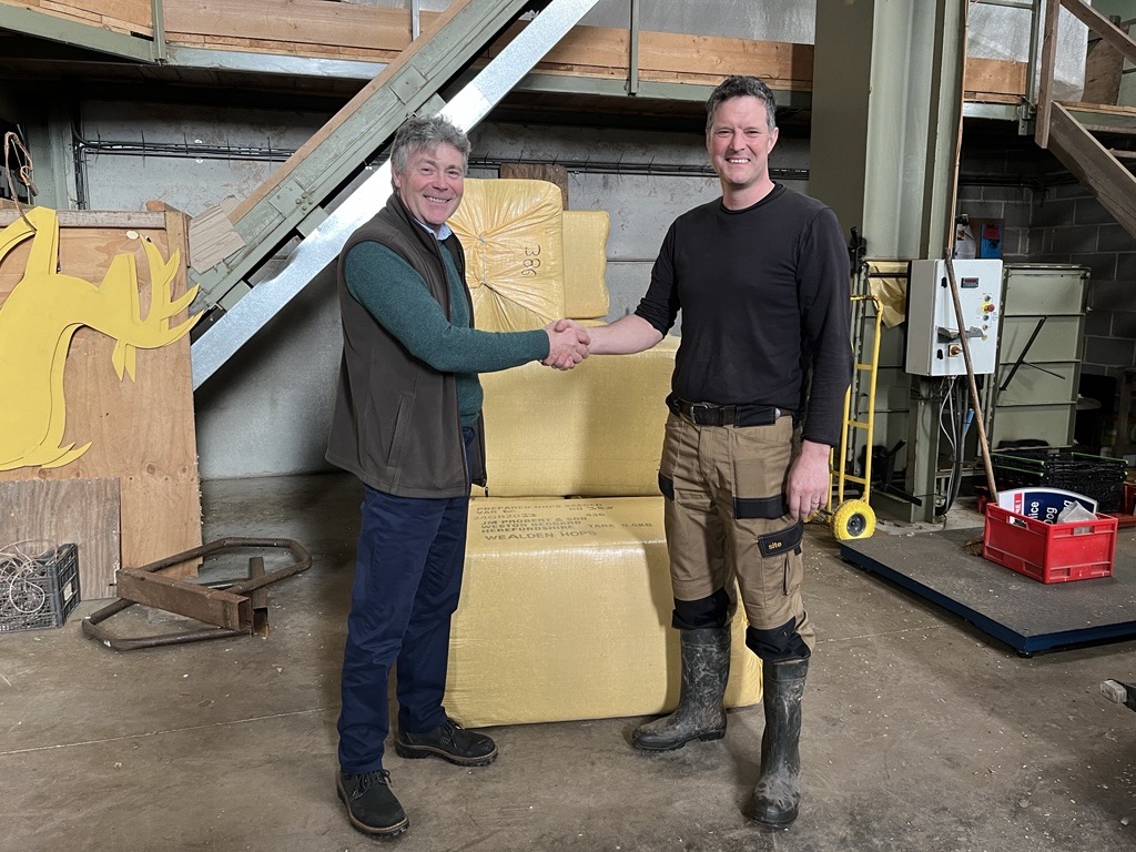 British Hop growers shaking hands